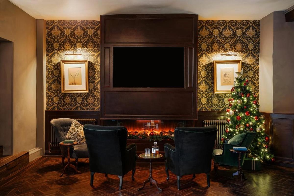 Boringdon Hall Hotel And Spa Плаймаут Экстерьер фото The fireplace in the lobby